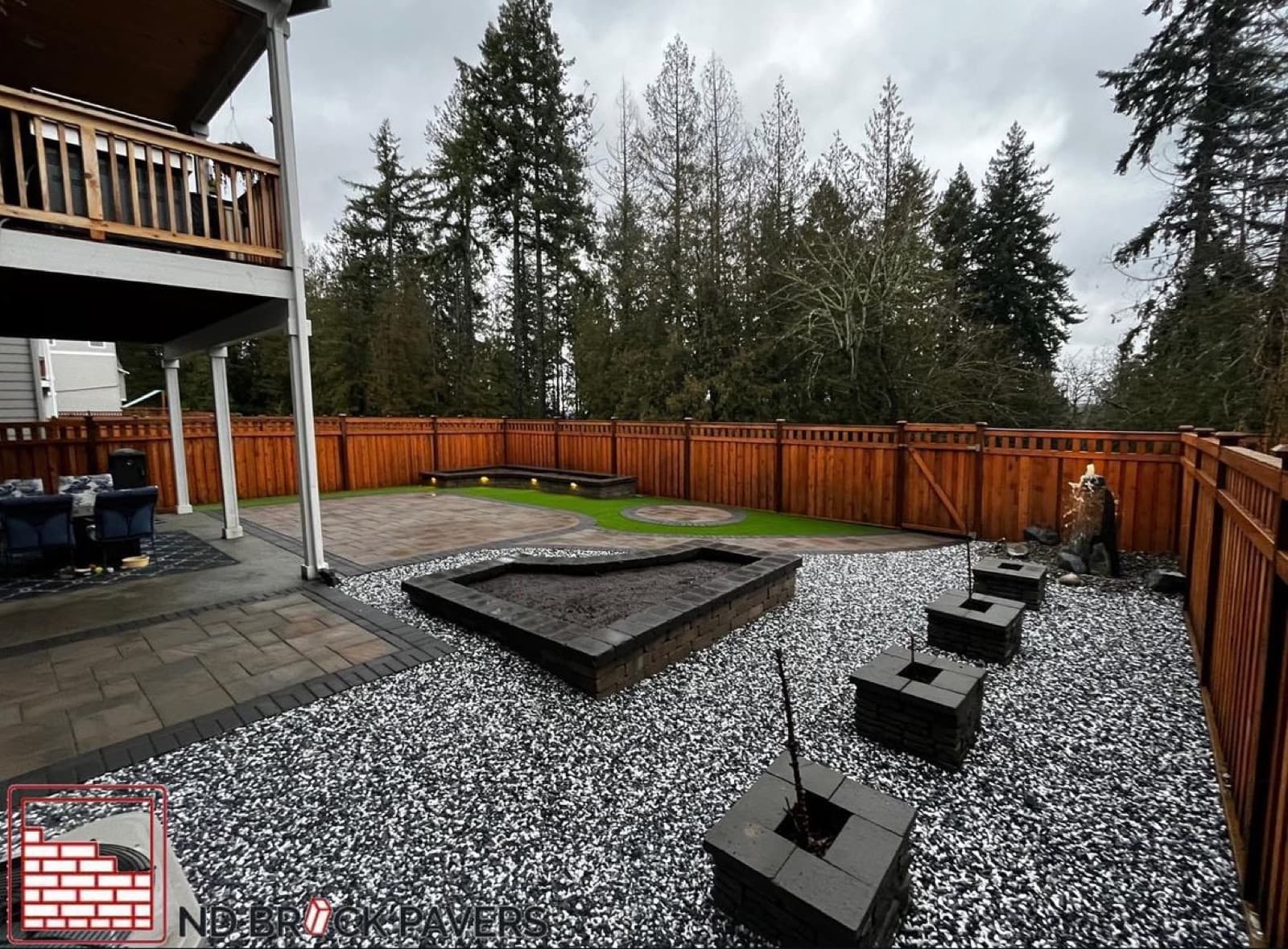 Completed hardscape project with patio and walkway integration