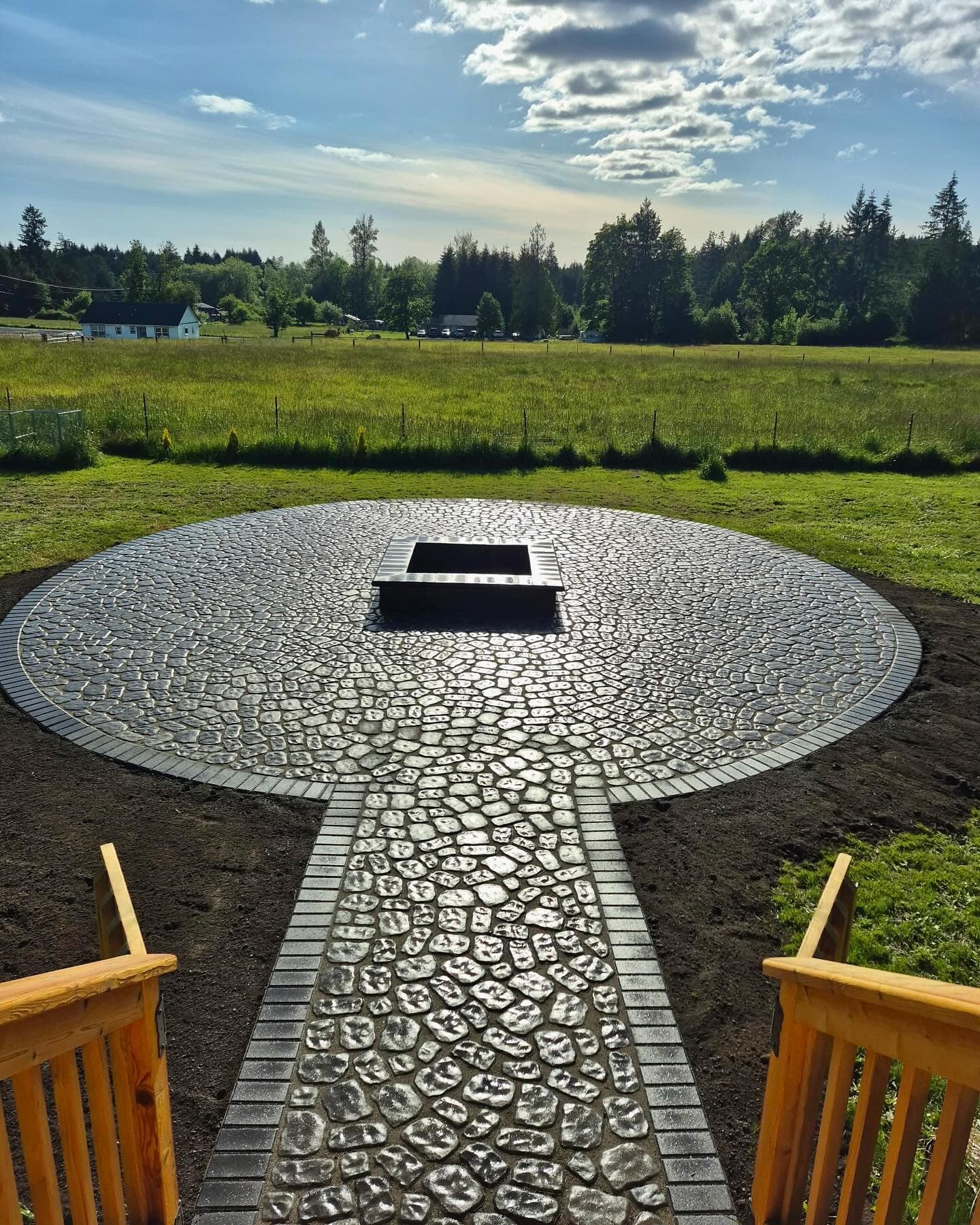 Circular paver patio and fire feature built by ND Brick Pavers in Pierce County