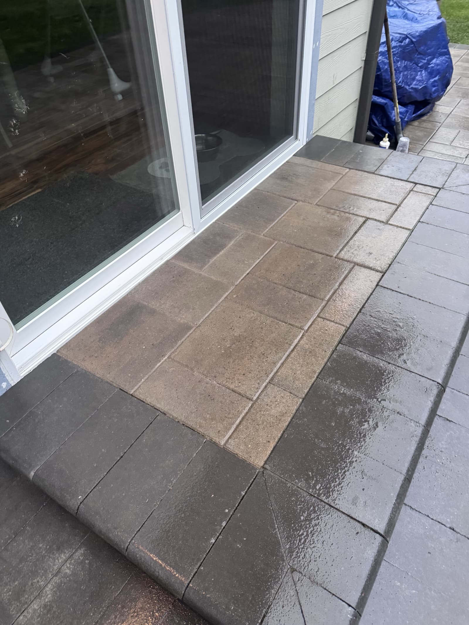 Paver patio with built-in seating and fire feature