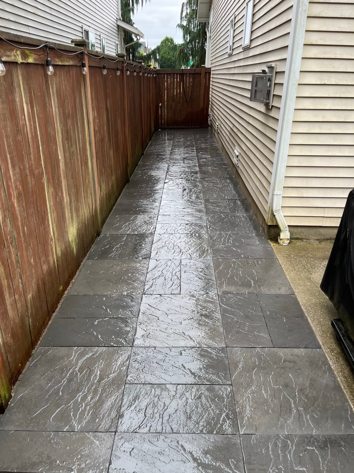 Full paver driveway replacement with herringbone pattern