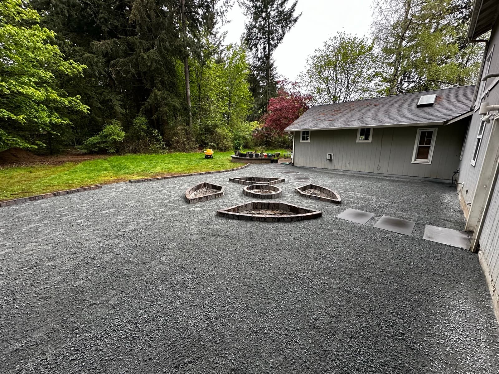 Paver driveway with decorative border and matching walkway
