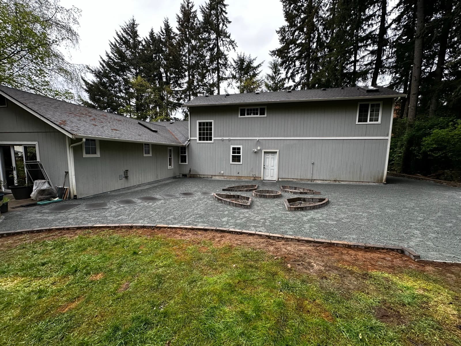 Paver driveway extension with integrated parking pad