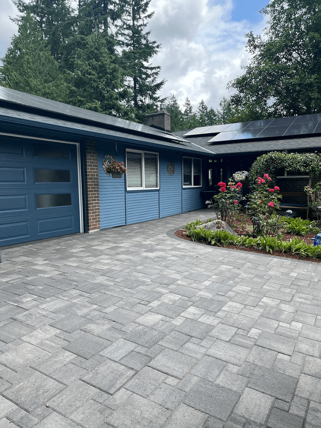 Finished gray paver driveway at a residential home